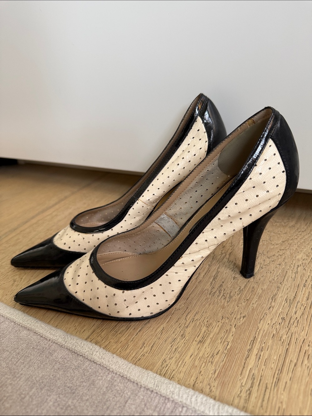 Pointed Toe Two-Tone Perforated Pumps in Cream and Black